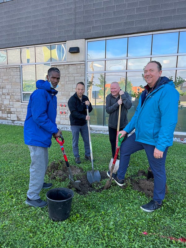 Hamilton General Hospital Staff and Volunteers plant trees in celebration of National Forest Week.