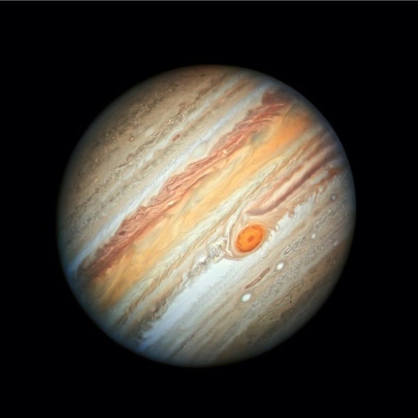 Jupiter, as seen from the Hubble Space Telescope on June 27, 2019, features the Great Red Spot, a storm the size of Earth that has been raging for hundreds of years. The planet appears tilted at a 45 degree angle and its many bands of clouds encircling the planet are visible in oranges, grays, browns, and whites. Credits: NASA, ESA, A. Simon (Goddard Space Flight Center), and M.H. Wong (University of California, Berkeley)