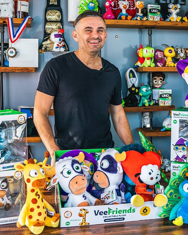 Photos of the founder Gary Vaynerchuk holding his toys. 