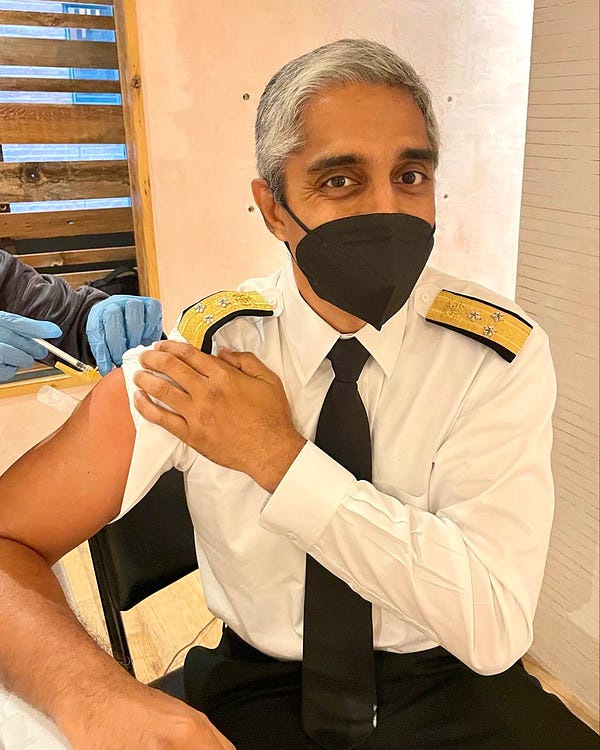 U.S. Surgeon General Vivek Murthy getting his updated COVID-19 vaccine and flu shot.