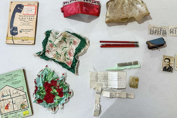 The belongings inside the purse show the life of a teenage girl in the 1950s.