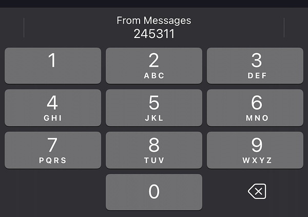 Screenshot of the iOS software keyboard with “From Messages” on the QuickType bar.