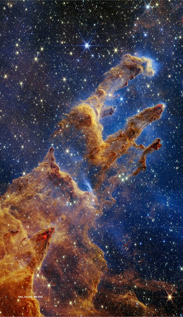 The Pillars of Creation are set off in a kaleidoscope of color in NASA’s James Webb Space Telescope’s near-infrared-light view.