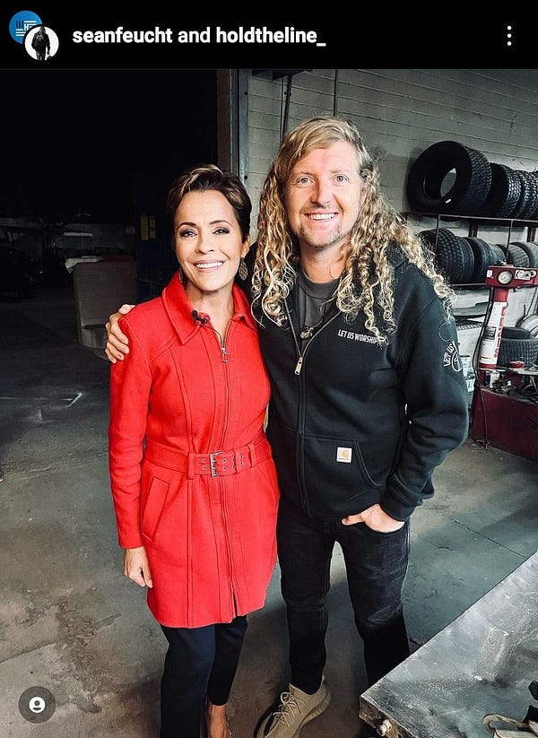 photo of kari and sean in a tire shop