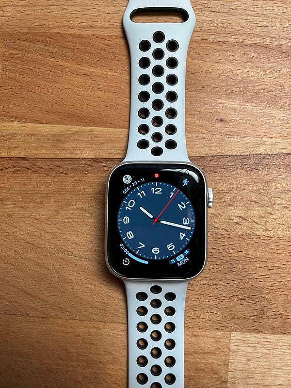Apple watch on wooden tabletop