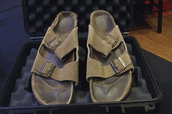 In this photo provided by Julien's Auctions are Steve Jobs' Birkenstock sandals sold at their Idols & Icons Rock N' Roll auction at the Hard Rock Cafe in New York.