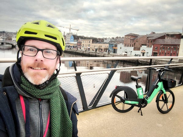 Oliver Moran with a Bolt electric bike on Mary Elmes Bridge.