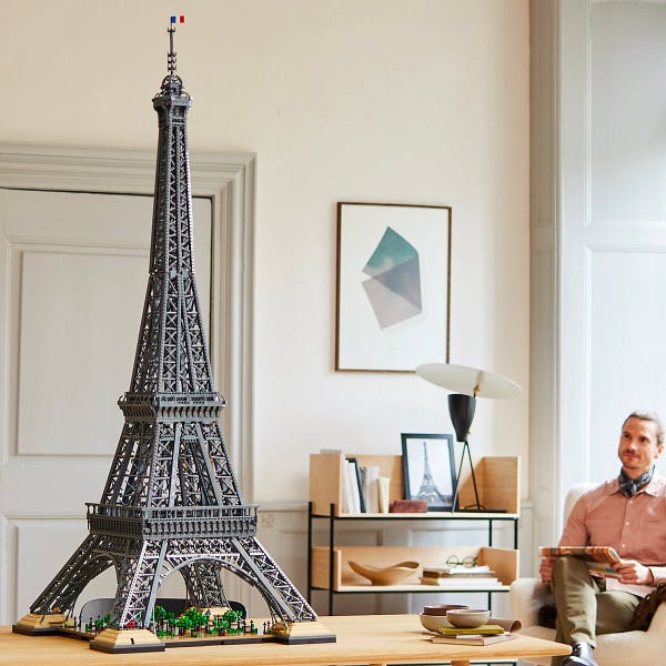 enormous eiffel tower model, completed state, in a living room
