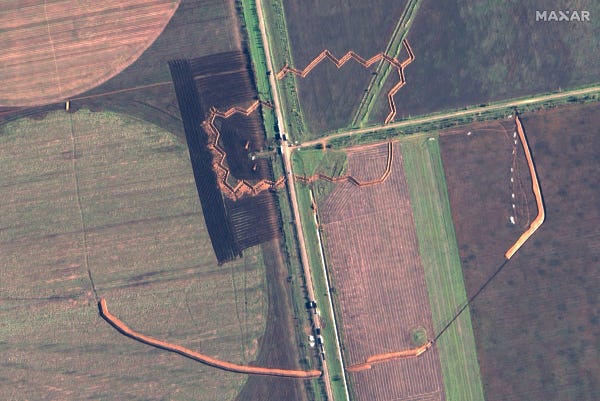 Trenches, fortifications, and tank obstacles near Stepne, Kherson Oblast, Russian-occupied Ukraine (15 NOV 2022) - 34.0782591°E 46.7773084°N - Satellite image ©2022 Maxar Technologies
