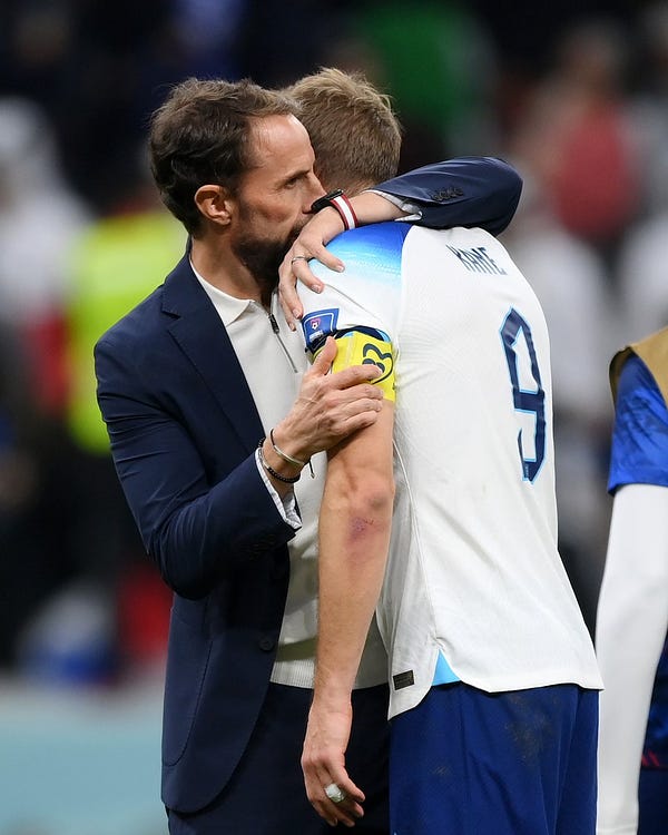 Gareth Southgate consoles Harry Kane after the game.