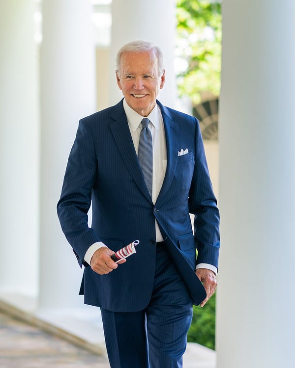 President Biden walks outside.