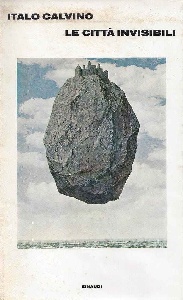 Book cover of Invisible Cities "Einaudi" Italian edition (title "Le Città Invisibili") with cropped image of René Magritte's "The Castle of the Pyrenees" on a white background