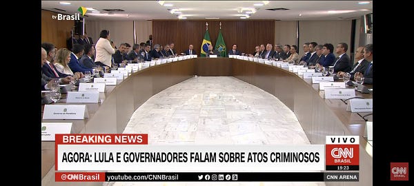 A picture of a meeting of Brazilian president, supreme court president and representatives of all Brazilian states. The title reads: Lula and Governors speak out against criminal acts. All in portugu se. Screenshot from CNN Brasil 