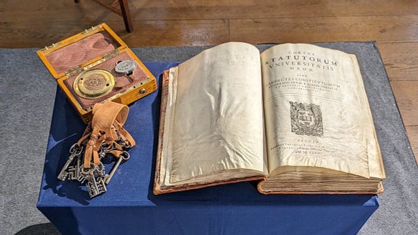 The University seal, keys and Book of Statutes c. Faye McLeod