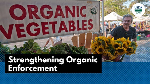 image of man standing at farmers market display with an Organic Vegetable sign and text; Strengthening Organic Enforcement. 