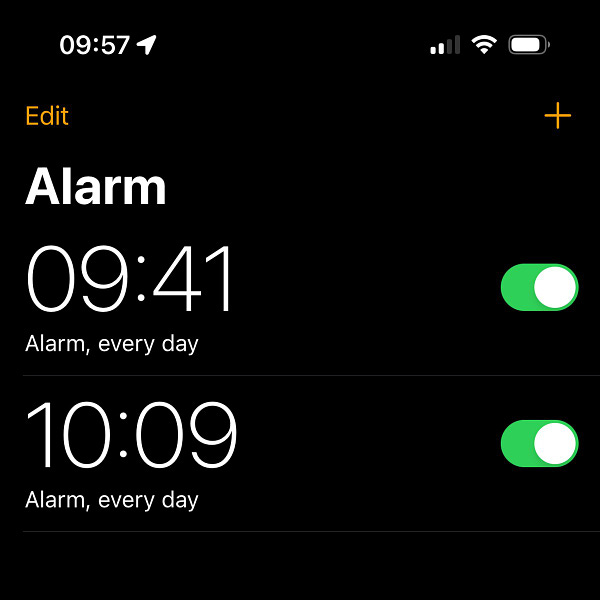 A screenshot of the iOS Clock app with alarms set for 9:41am and 10:09am.