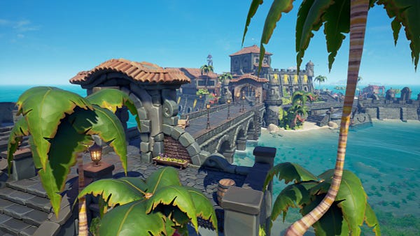 A screenshot of an island from Sea of Thieves known now as New Golden Sands. A stone bridge with multiple archways leads to a grey-stone port town.