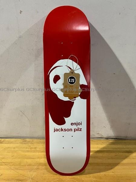 Red skateboard deck with image of a white panda and text on deck: enjoi jackson pilz.