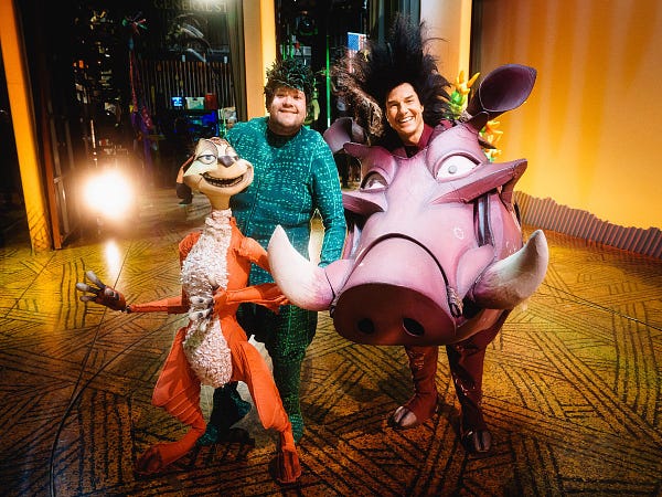 Photo of James Corden dressed as Timon and Tom Cruise dressed as Pumbaa backstage at a performance of The Lion King