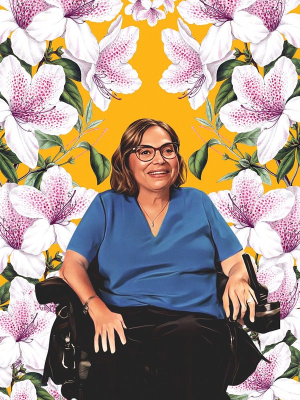 A digital illustration collage of A headshot of Judy Heumann, a white woman with shoulder-length brown hair wearing red glasses, a blue v-neck shirt, and a gold necklace. She is smiling warmly. Behind her is a pattern of cascading of flowers flowing on a yellow/gold background