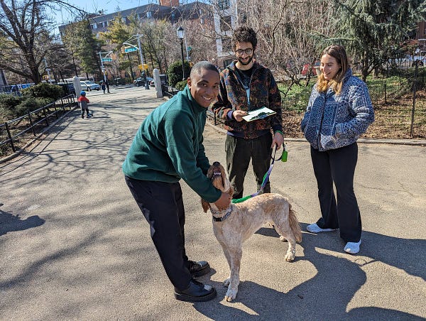 Chi Ossé with 2 human constituents and 1 dog constituent 