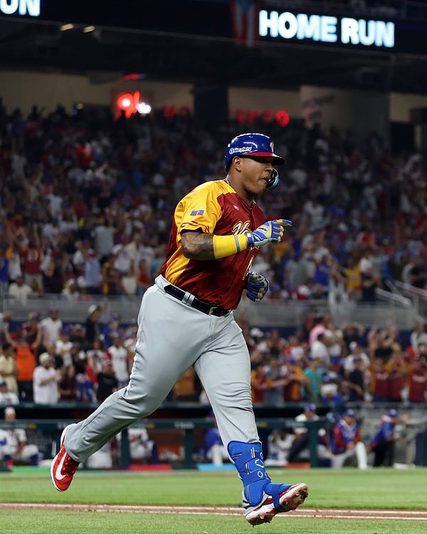 Salvador Perez rounds the bases after hitting a three-run home run for Team Venezuela at the World Baseball Classic. (Photo by Rob Tringali/Getty Images)