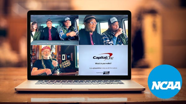 Laptop open to four Capital One ads with an NCAA logo in the corner.