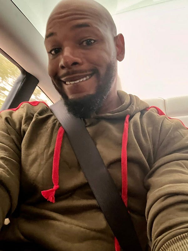 Me in my Uber on the way to the port of air. I’m smiling because I am happy!