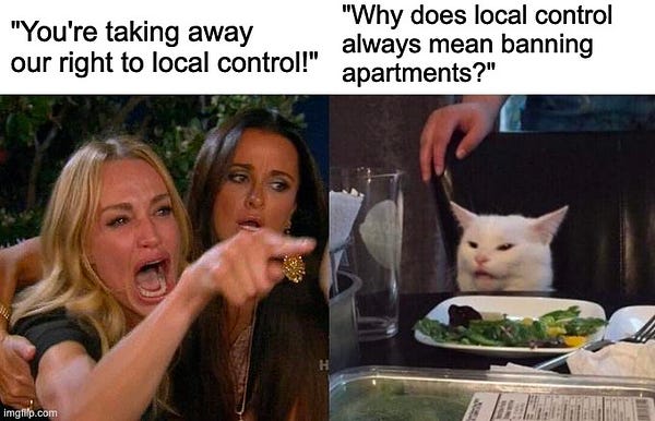 Woman yelling - "You're taking away our right to local control!"
Cat - "Why does local control always mean banning apartments?"