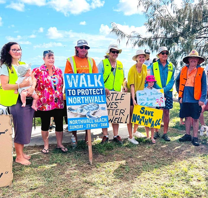 Amanda Camm MP and community members walk to protect North Wall Beach at Mackay Harbour.