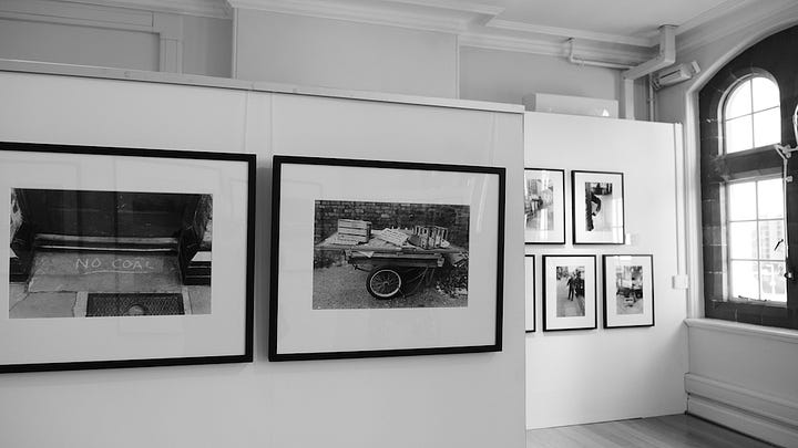 images of Pete Davis' CITY STORIES photography exhibition in the Futures Gallery located upstairs in the Pierhead Building in Cardiff Bay