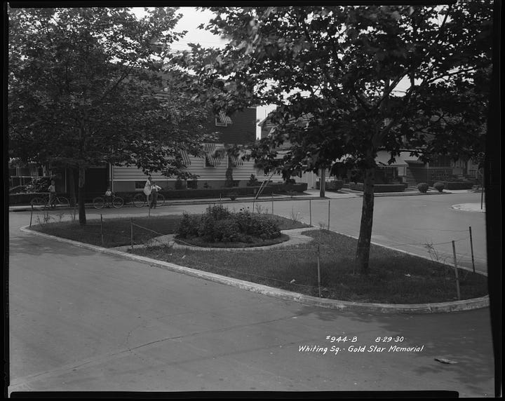 Images show photographs of the Gold Star Memorial on the south end of Whiting Square. In the 1930 photo, the memorial consists of a small circular garden. In the 1932 photo, the memorial also includes three benches facing the garden.