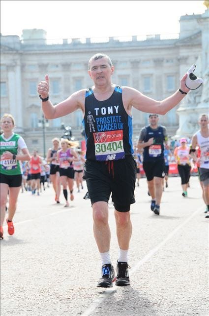 Tony Collier running and his marathon major medals