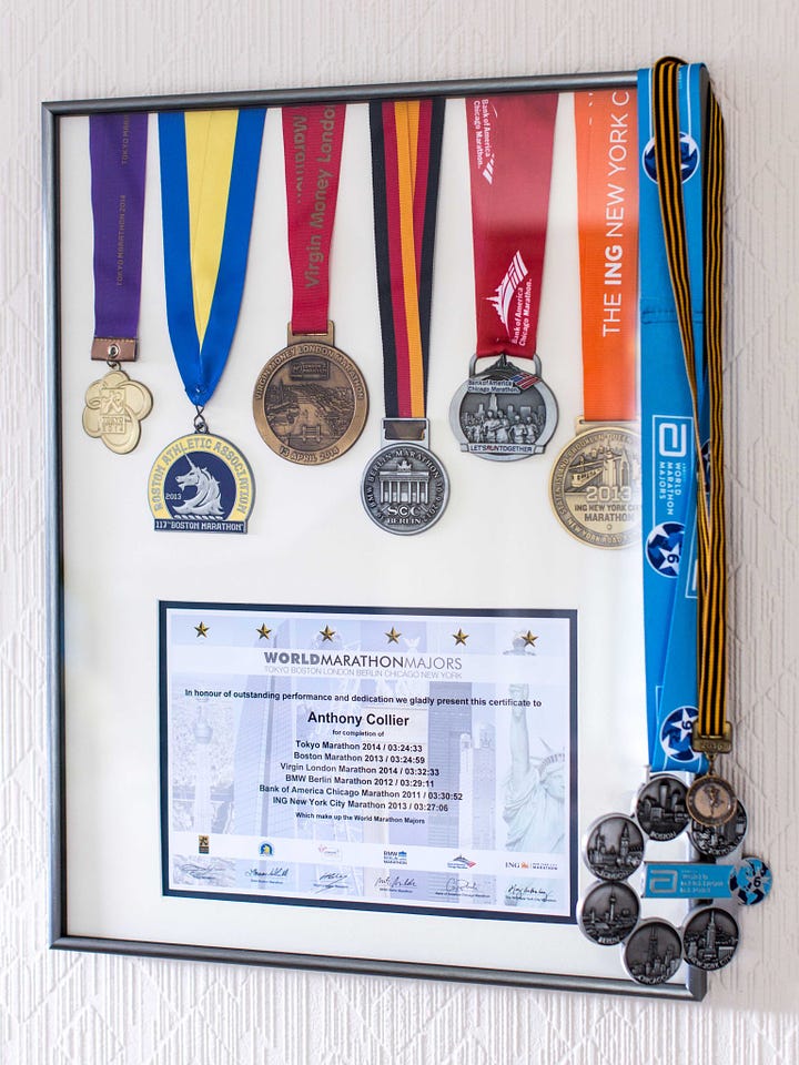 Tony Collier running and his marathon major medals