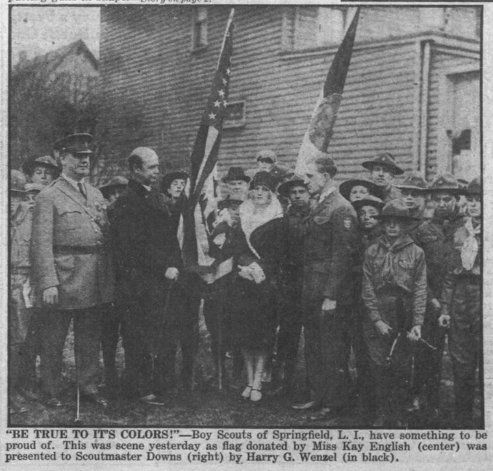 Images are two photographs of a ceremony outside Whiting Memorial Hall in Woodhaven. A group of people stand while several figures hold the flag.