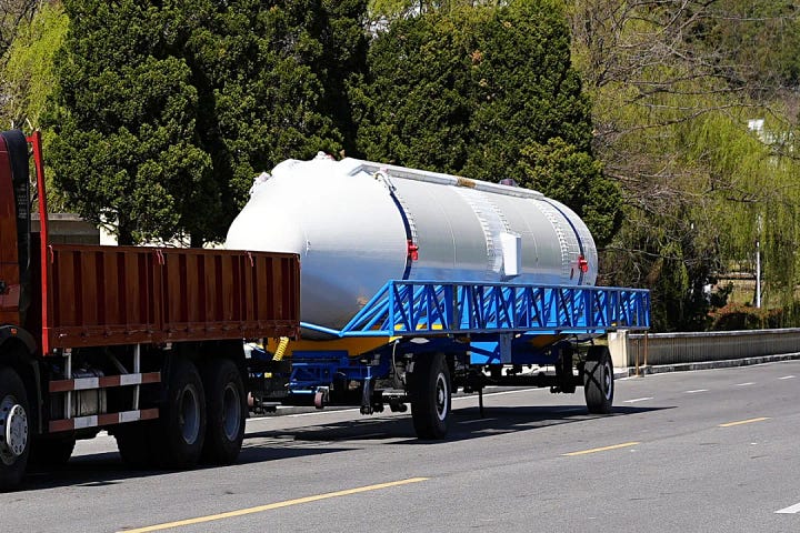 Hardware for the Long March 3B/E heading to the launch pad and being prepared for launch.