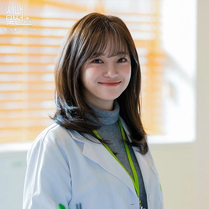 four images of actress Kim Sejeong in her role as Shin Hari in the Kdrama Business Proposal.