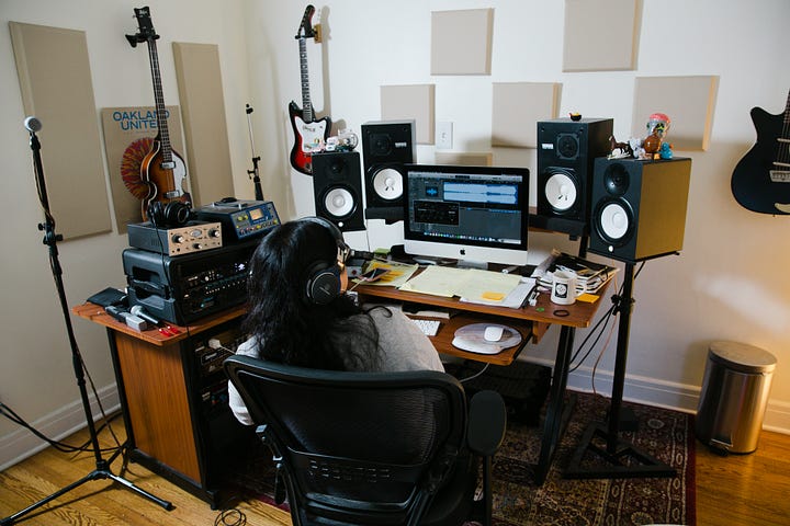 Various photos of musicians in their home studios.