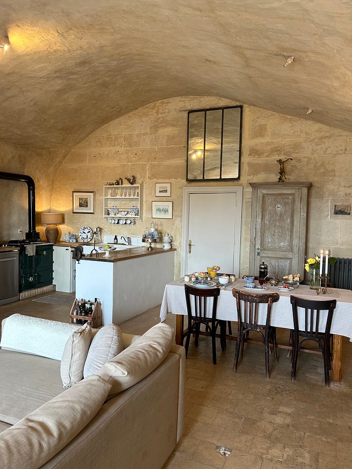 Scenes from troglodyte cave home near Amboise. Breakfast table, bedroom with bathtub and details.