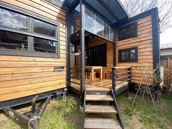 Bedroom, kitchen, patio of Tiny Base River House in Kawazu, Shizuoka, Japan.