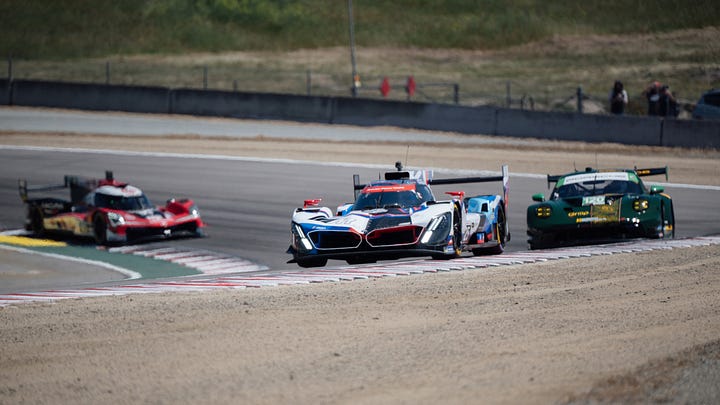 Photos of BMW M Team RLL cars attacking the track at Laguna Seca for the Monterey round IMSA sportscar championship in May 2025. Photos by Walter Fulbright.