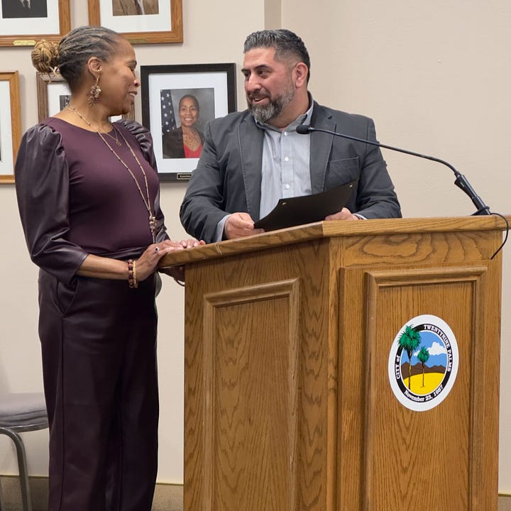 Ex-Mayor Karmolette O'Gilve accepts the Black History Month proclamation from current Mayor Steven Bilderain; Public Art Advisory Committee member Paul Razo joins Chair Anna Stump in advocating for the 29! sculpture.  