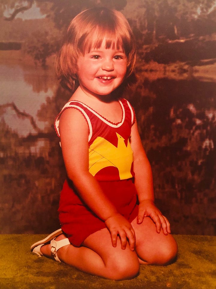 Two studio portraits of me, ages 3 or 4. In one I am wearing a shiny turquoise leotard, white tutu, and pink ballet shoes; in the other I am wearing my Wonder Woman underoos and strappy white sandals (again, this was in a PROFESSIONAL STUDIO PORTRAIT).