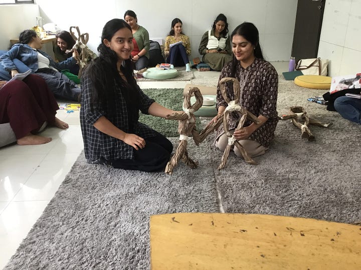 Participants on the NDP India course making puppets