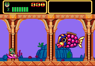 A pair of screenshots of the game's first boss fight against a giant flying fish that shoots its scales at you in the form of smaller fish. On the left is the Turbografx CD version, on the right, the more squished-looking Mega Drive one.