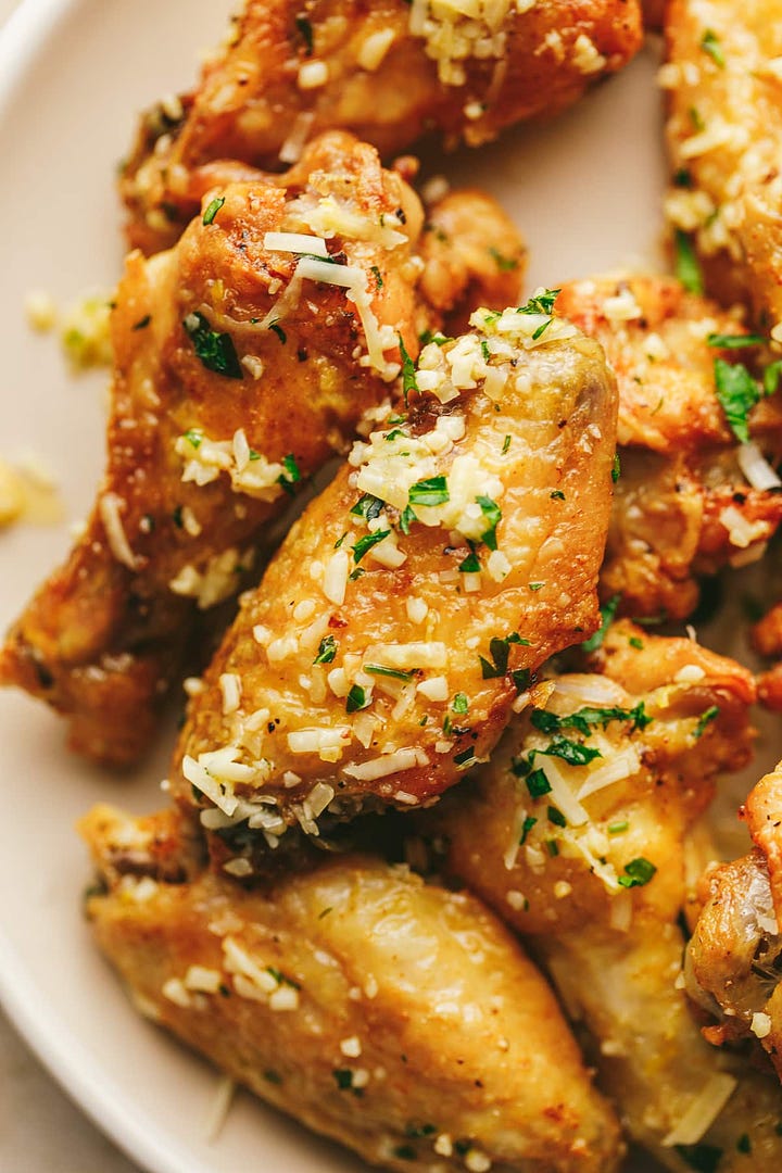 Wings with garlic parm sauce and a whipped cottage cheese dip