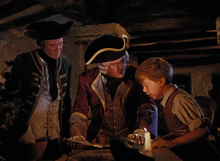 The treasure map; Dr. Livesey (Denis O'Dea), Squire Trelawney (Walter Fitzgerald), & Jim look at the map.