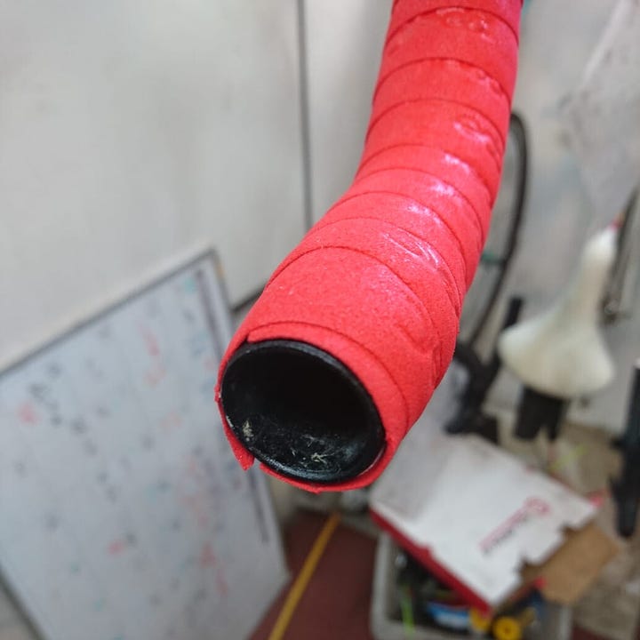 Red bar tape has a bad start at the bottom of the bar, and a poor finish at the end