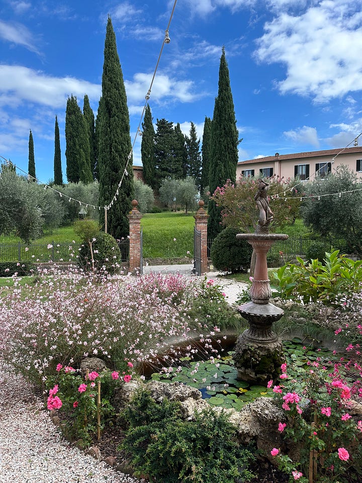 The image on the left shows a beautiful fountain surrounded by flowers and lilypads. There are tall trees in the distance and a hotel up on the hill behind it. The photo on the right shows a big bright orange and cream colored villa, with 3 archways at the entrance and many windows. There is a green lawn in front of it, with some pomegranate trees. 