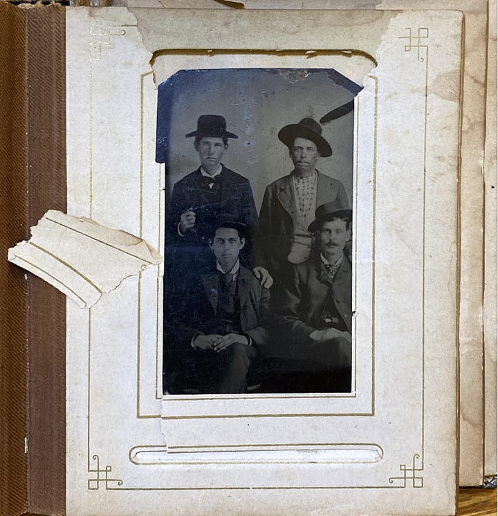 Old, leather covered album of tintype photographs